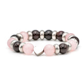 Handmade bracelet for love and loyalty with pink and deep red beads.